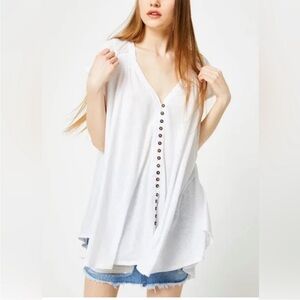 Free People white raw cotton top with buttons.